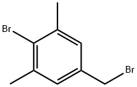 Benzene, 2-bromo-5-(bromomethyl)-1,3-dimethyl-